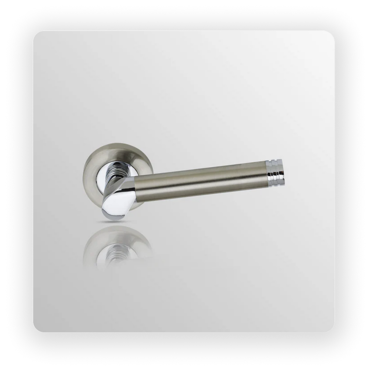 Door handle on round rose in Satin Nickel/ Polish Chrome finish