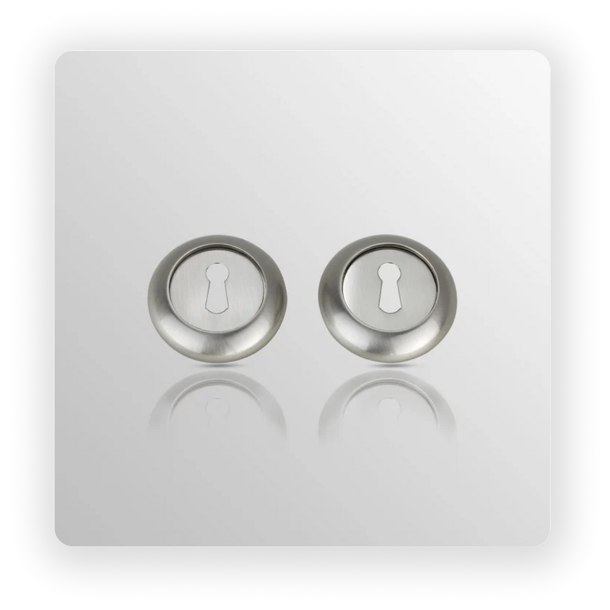 RAISED ROUND KEY ESCUCTHEON in Satin Nickle finish